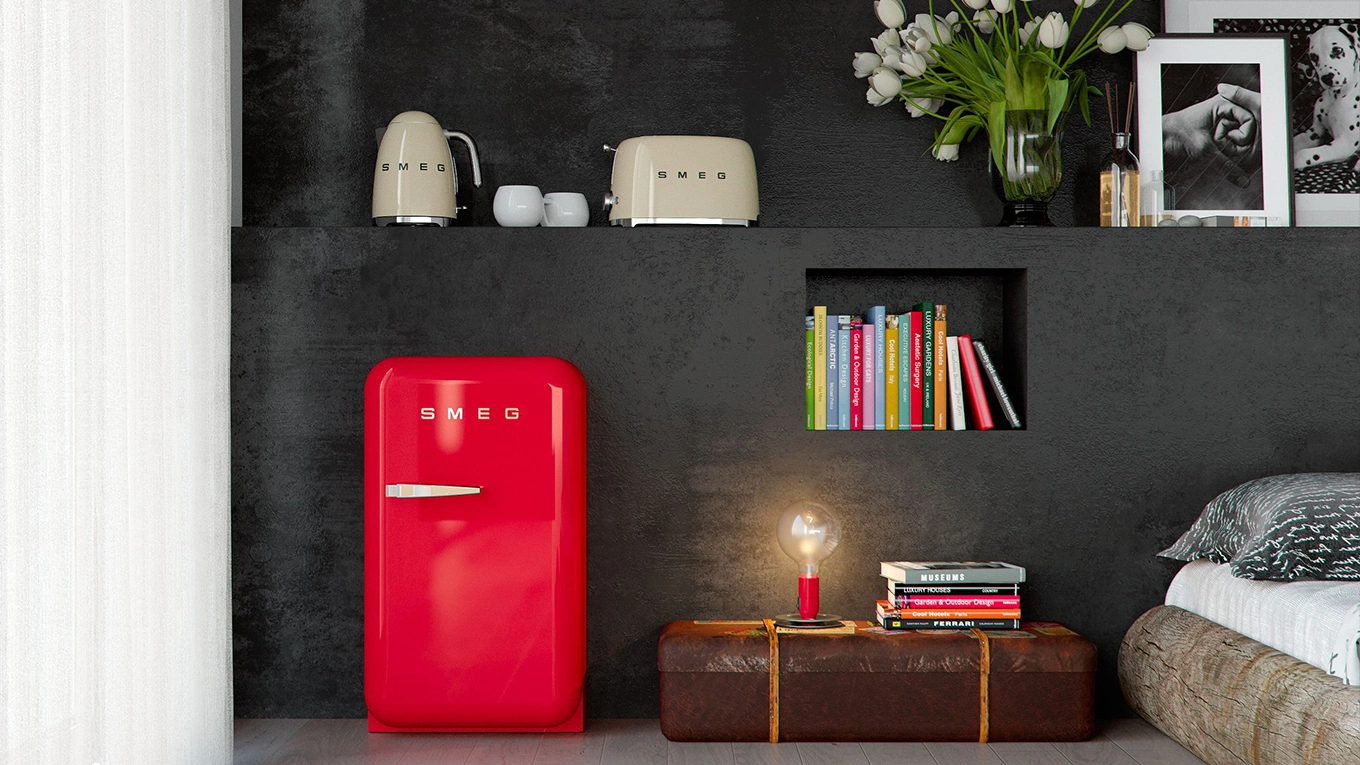 Smeg fab5 mini kühlschrank in rot in einem dunklen schlafzimmer