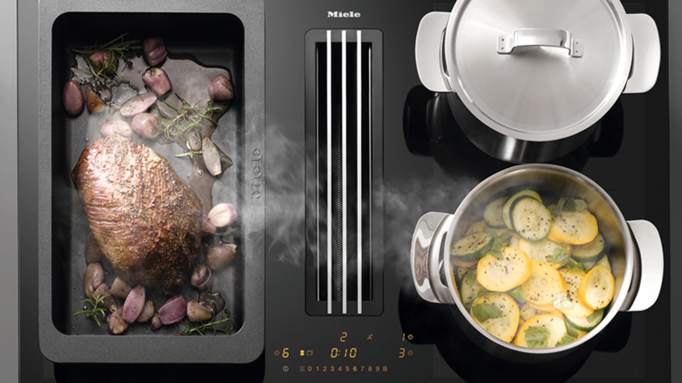 miele kmda 7476 kochfeld miele kmda 7476 kochfeld mit bräter und töpfen beim absaugen von kochdunst