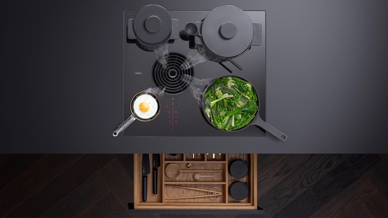 BORA S PURE mit Schublade unterm Kochfeldabzug bora s pure kleiner kochfeldabzug von oben mit darunterliegender schublade geöffnet