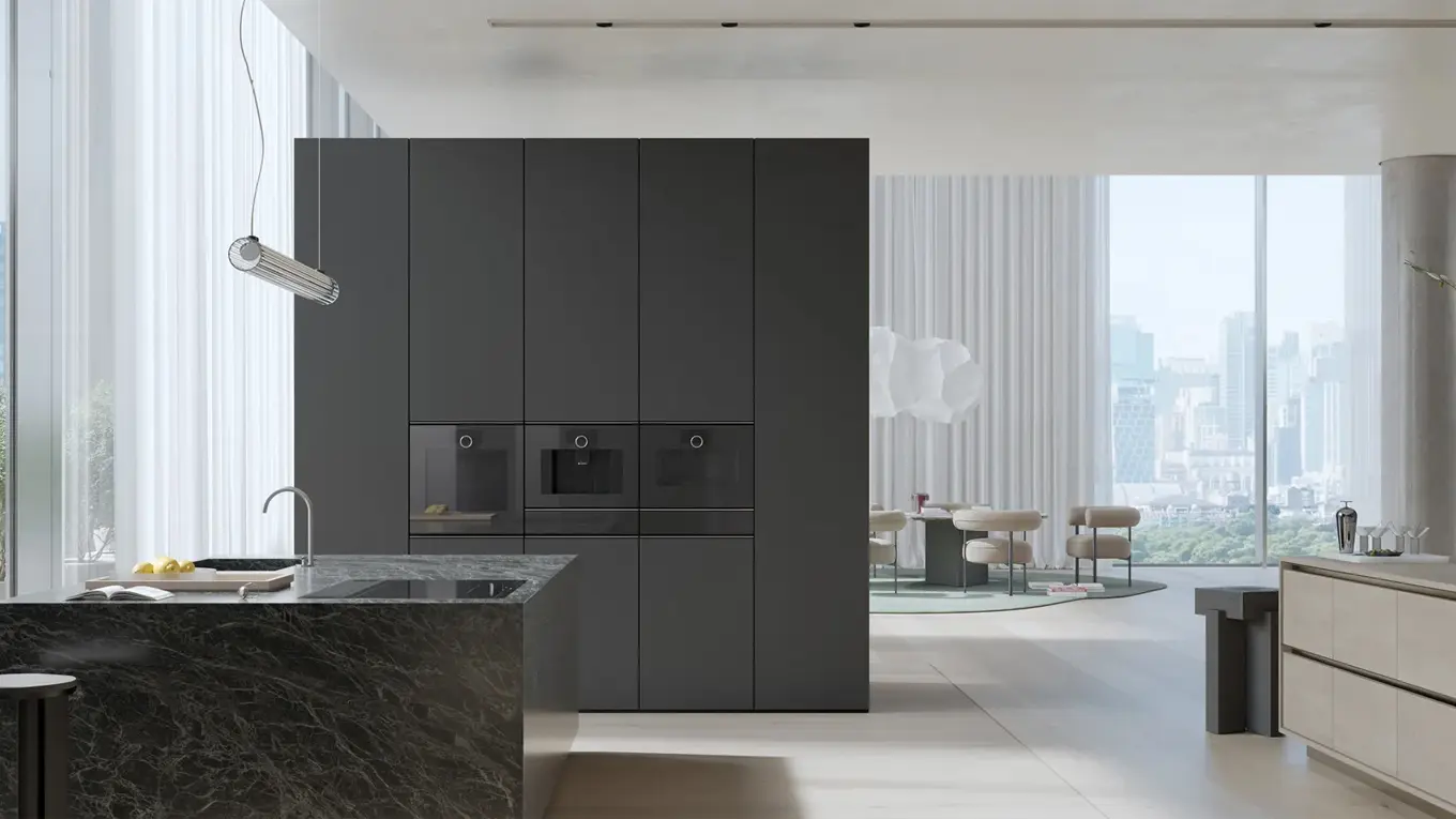 drei dunkle gaggenau minimalistic backofen in einer schwarzen Luxusküche