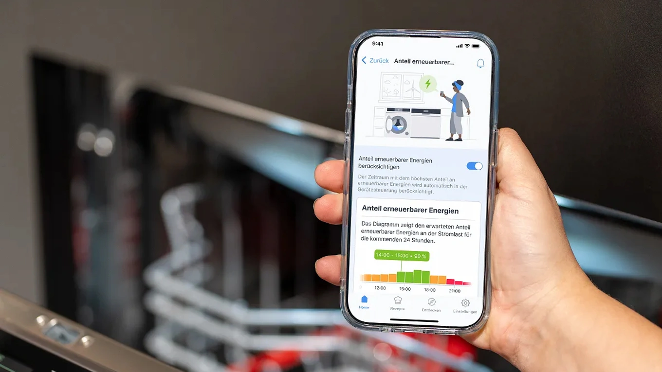 Smartphone mit Bosch App und Verbrauch vom Geschirrspüler