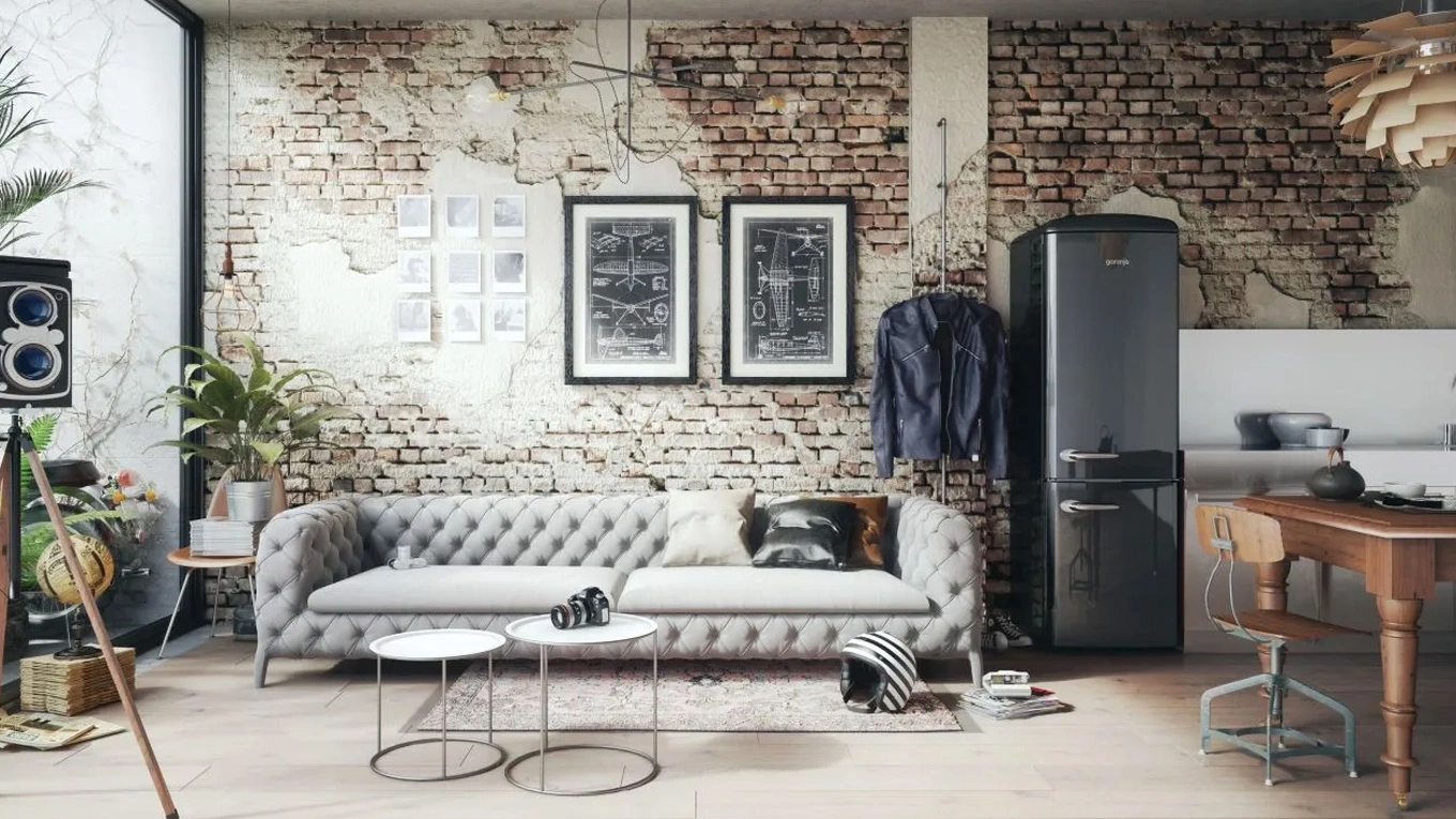 Gorenje Retro Kühlschrank Gefrierkombination in Schwarz neben einem Retro Sofa 